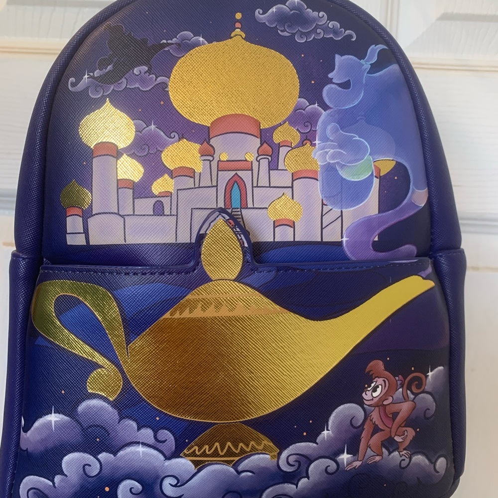 Loungefly mini backpack. Magic Lamp and Castle Backpack